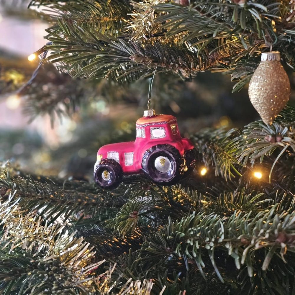 A little tractor bauble on the tree